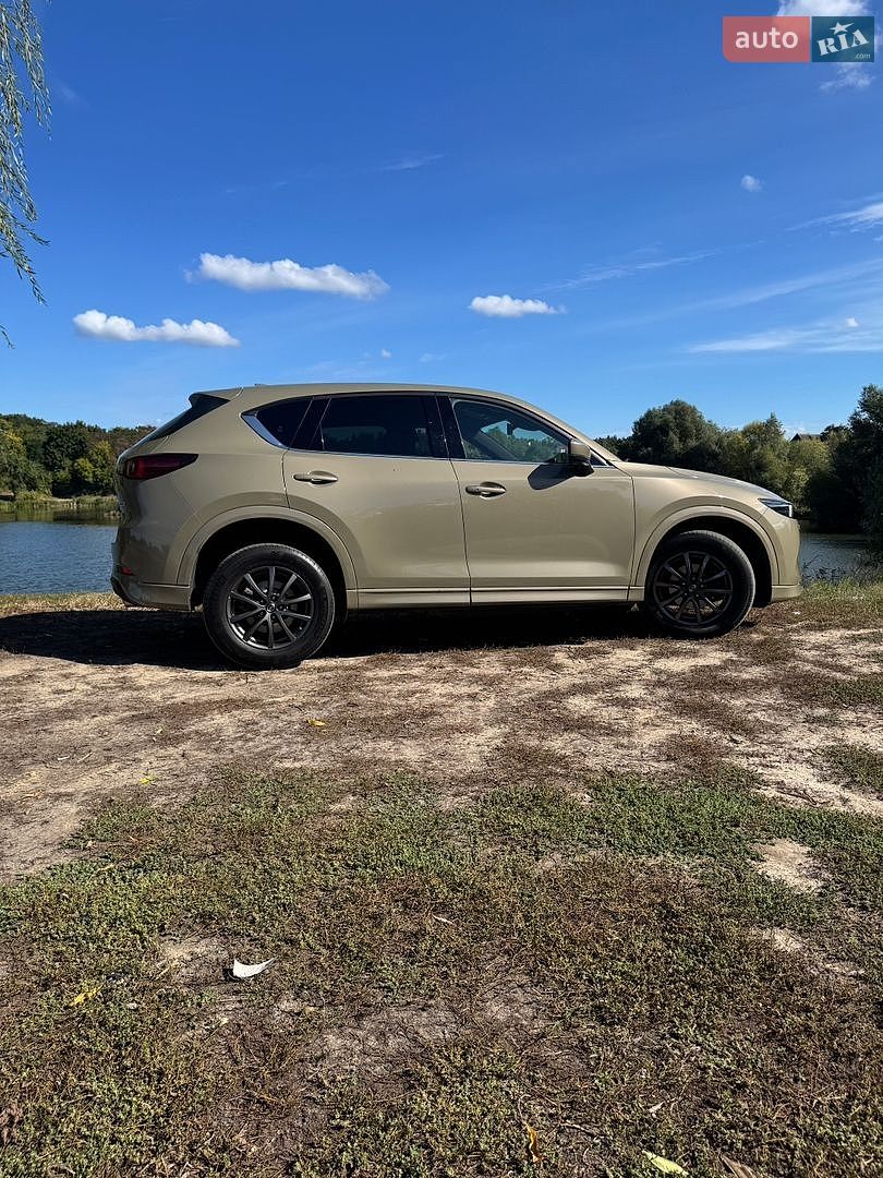 Mazda CX-5 2023 VIN JMZKEEWLA90357139 фото оголошення 8 з 13