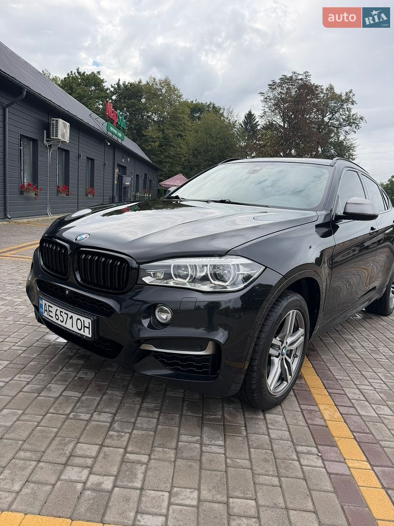 BMW X6 2017 VIN WBAKV610900W35968 фото оголошення 4 з 51
