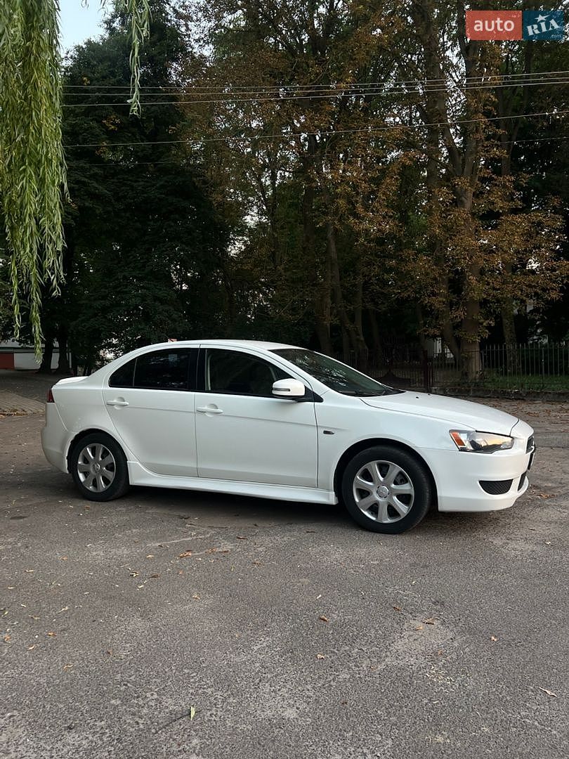 Mitsubishi Lancer 2015 VIN JA32U2FU6FU014777 фото оголошення 5 з 14