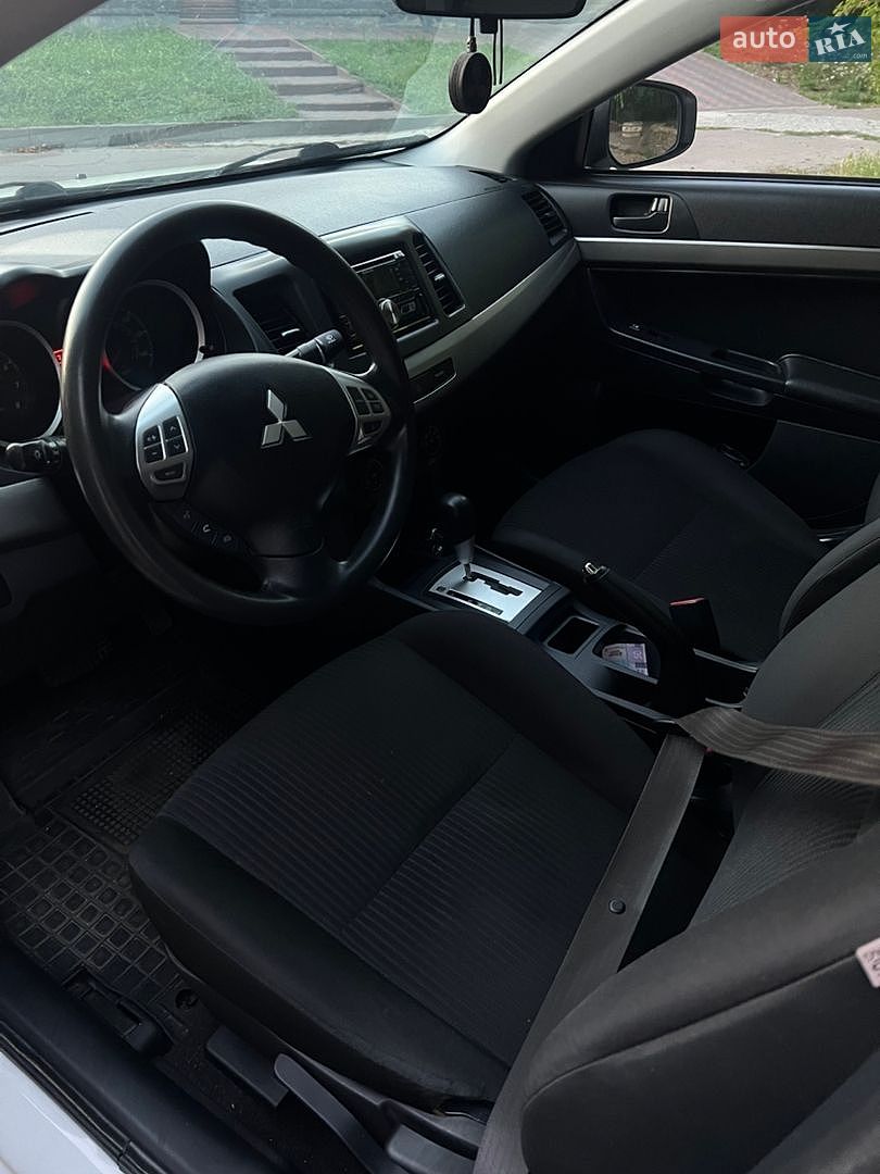 Mitsubishi Lancer 2015 VIN JA32U2FU6FU014777 фото оголошення 9 з 14