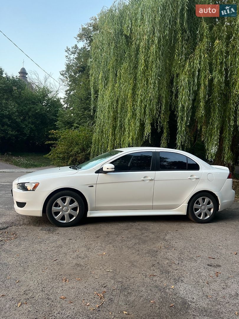 Mitsubishi Lancer 2015 VIN JA32U2FU6FU014777 фото оголошення 6 з 14