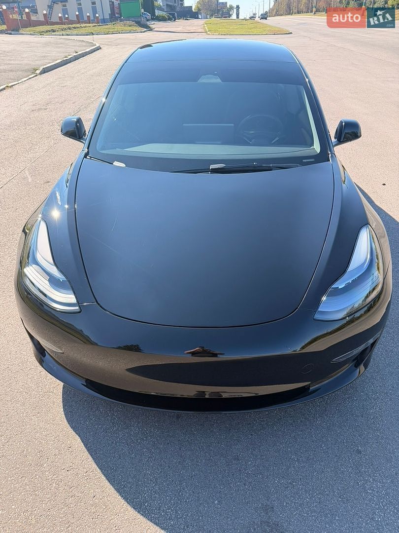 Tesla Model 3 2023 VIN 5YJ3E1EA3PF481041 фото оголошення 4 з 8