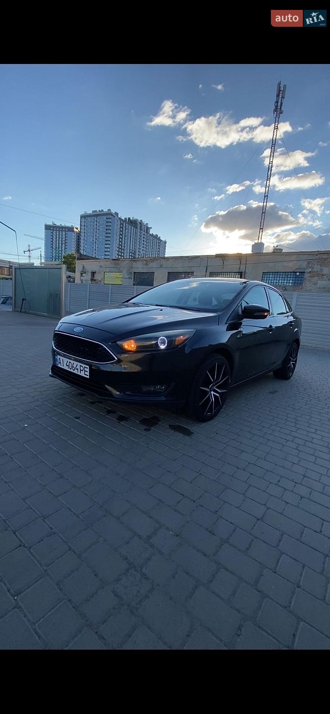 Ford Focus 2015 VIN 1FADP3F20FL306426 фото оголошення 10 з 18