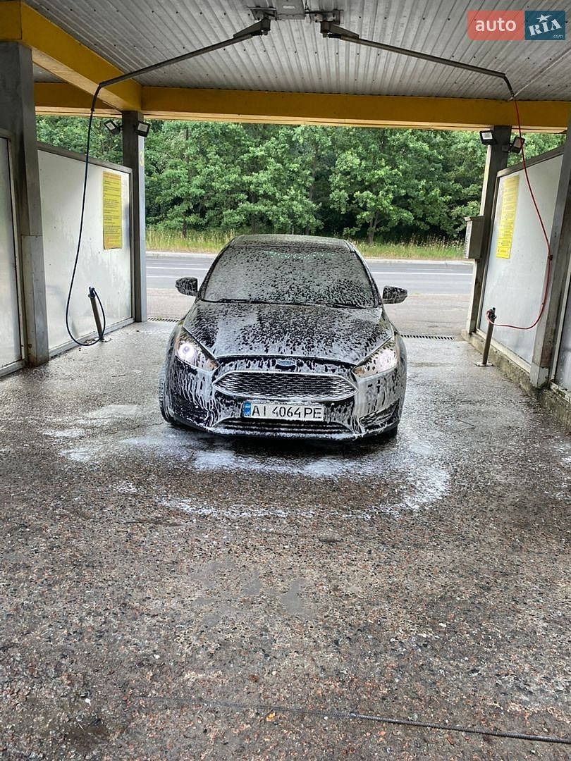 Ford Focus 2015 VIN 1FADP3F20FL306426 фото оголошення 14 з 18