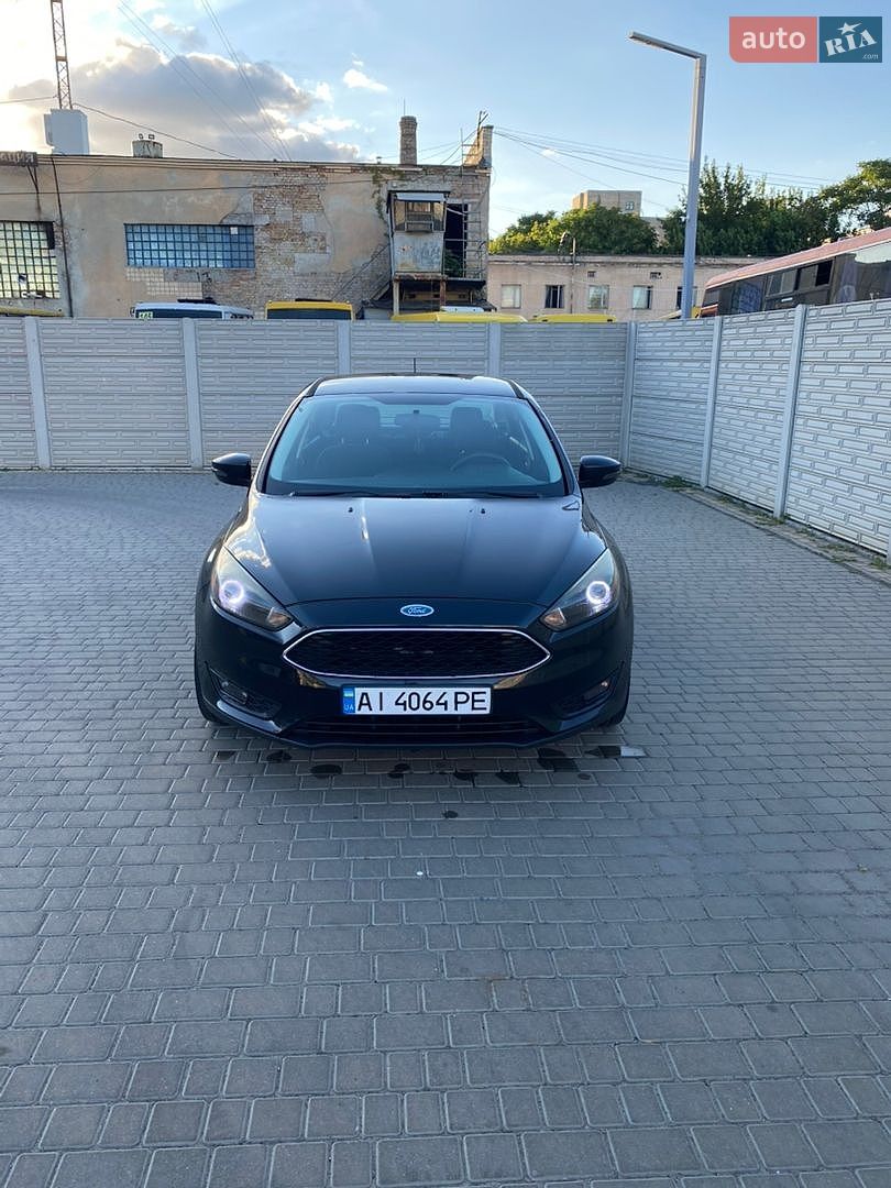 Ford Focus 2015 VIN 1FADP3F20FL306426 фото оголошення 16 з 18