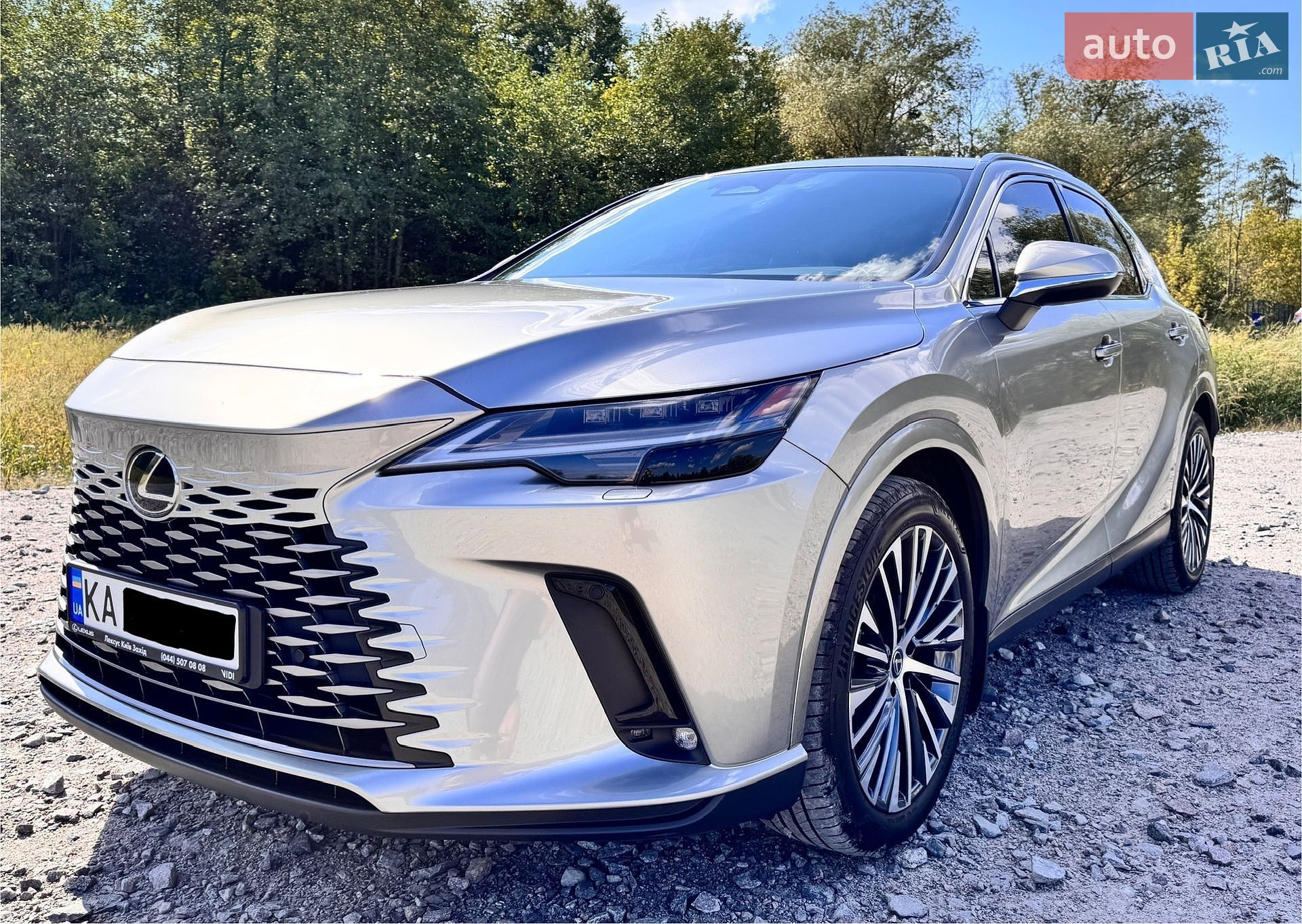 Lexus RX 2023 VIN JTJCHBJAX02004051 фото оголошення 6 з 18