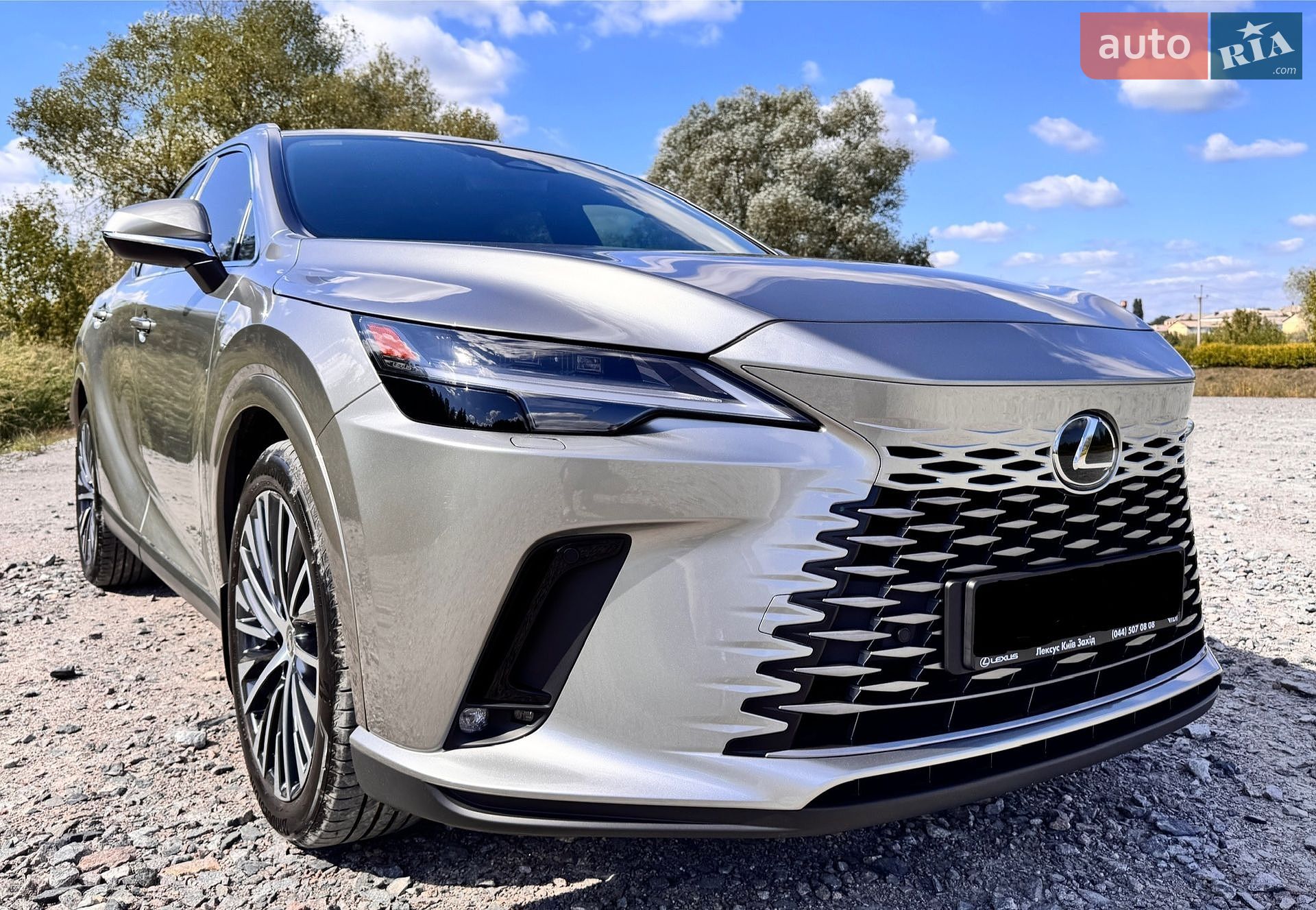 Lexus RX 2023 VIN JTJCHBJAX02004051 фото оголошення 8 з 18