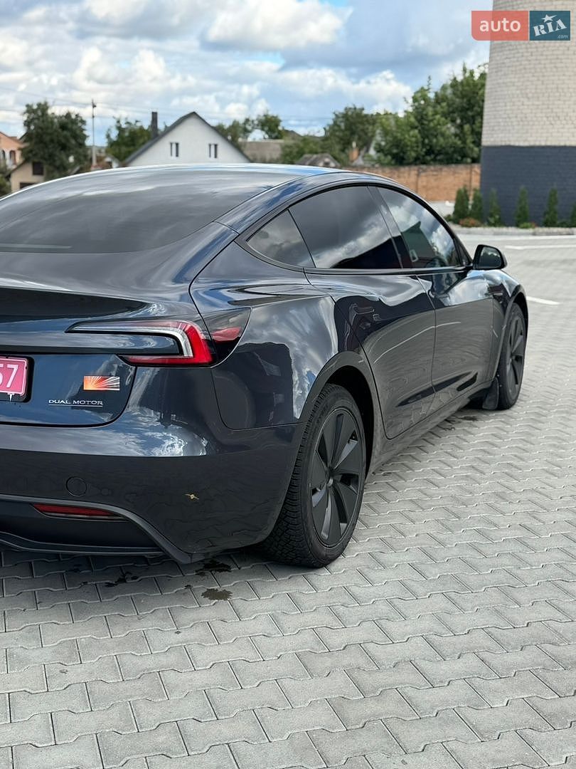 Tesla Model 3 2024 VIN LRW3E7EB1RC200458 фото оголошення 5 з 21