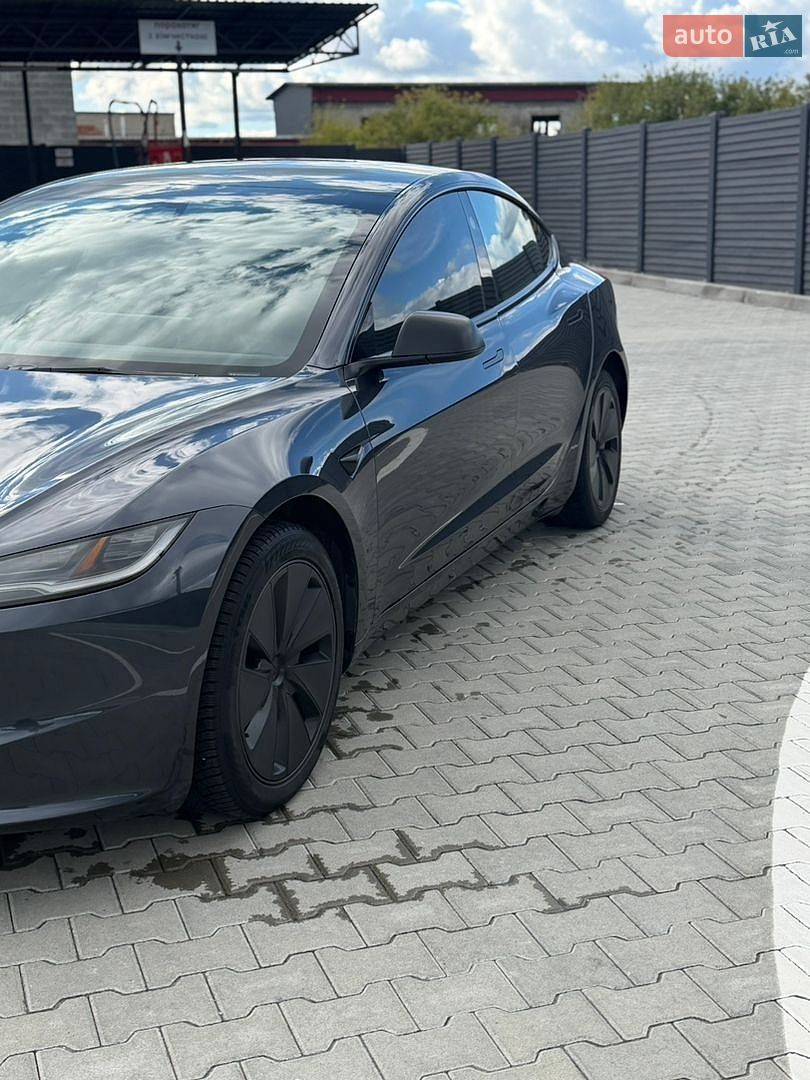 Tesla Model 3 2024 VIN LRW3E7EB1RC200458 фото оголошення 4 з 21