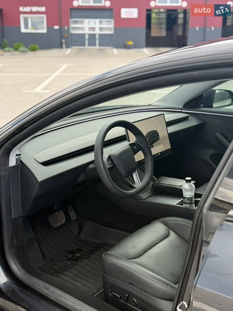 Tesla Model 3 2024 VIN LRW3E7EB1RC200458 фото оголошення 12 з 21