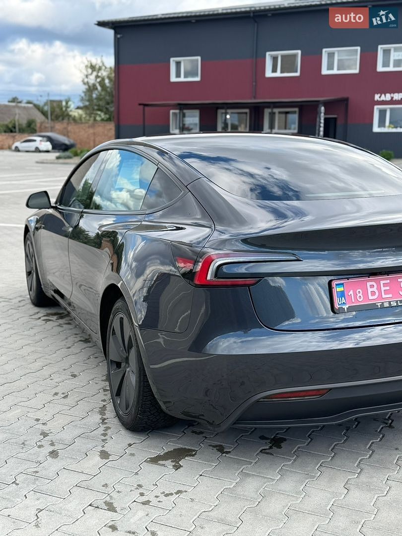 Tesla Model 3 2024 VIN LRW3E7EB1RC200458 фото оголошення 7 з 21