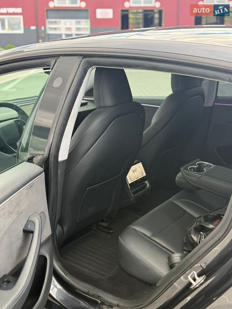 Tesla Model 3 2024 VIN LRW3E7EB1RC200458 фото оголошення 13 з 21