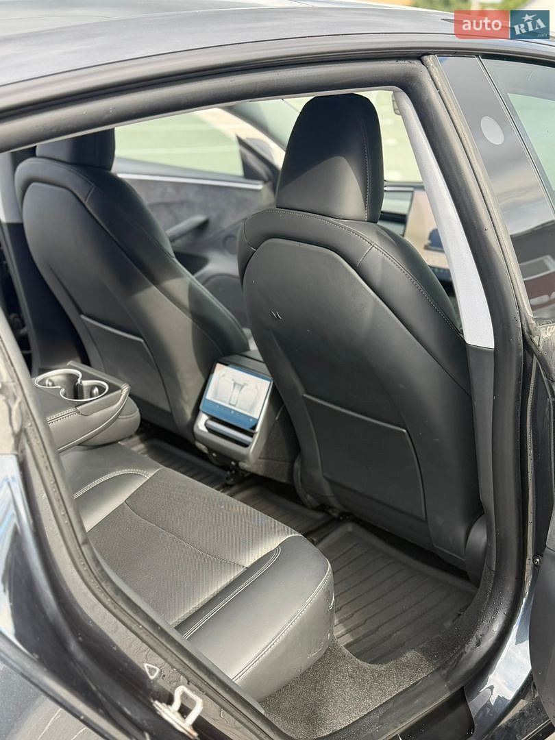 Tesla Model 3 2024 VIN LRW3E7EB1RC200458 фото оголошення 16 з 21