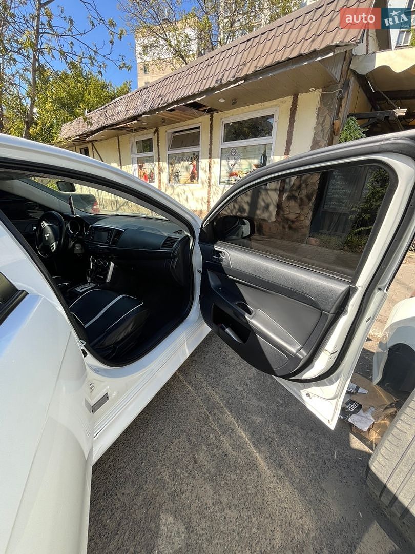 Mitsubishi Lancer 2016 VIN JA32U2FU4HU006745 фото оголошення 8 з 12