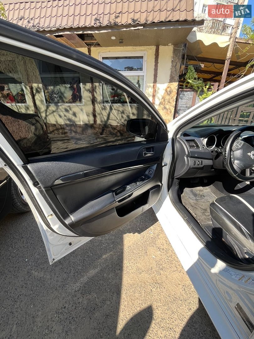 Mitsubishi Lancer 2016 VIN JA32U2FU4HU006745 фото оголошення 11 з 12