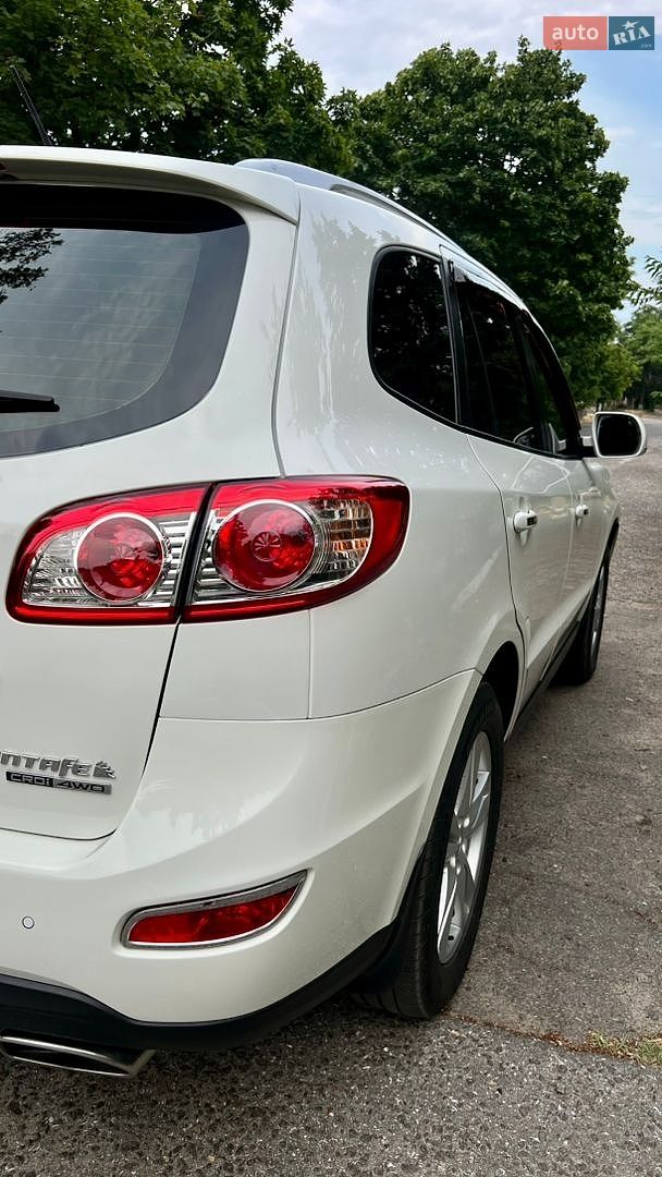 Hyundai Santa FE 2011 VIN KMHSH81XDBU774991 фото оголошення 28 з 68