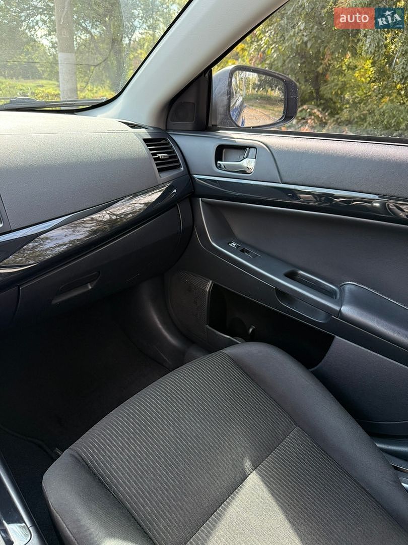 Mitsubishi Lancer 2016 VIN JA32U2FU0HU007343 фото оголошення 13 з 21