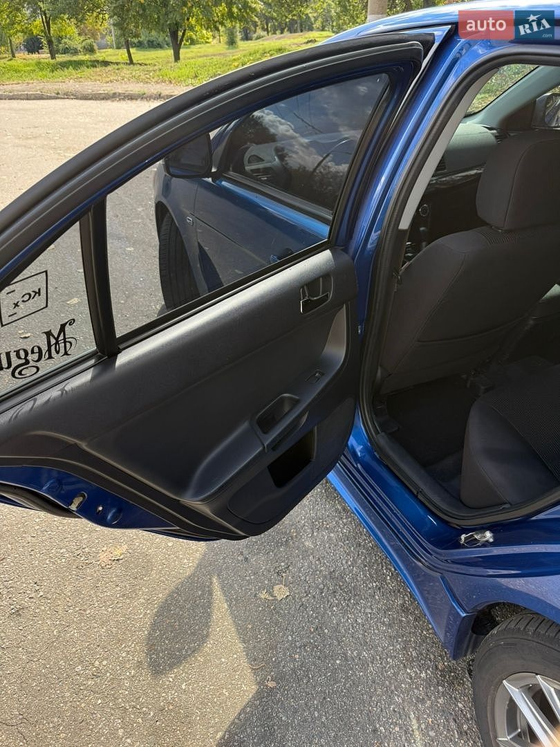 Mitsubishi Lancer 2016 VIN JA32U2FU0HU007343 фото оголошення 14 з 21