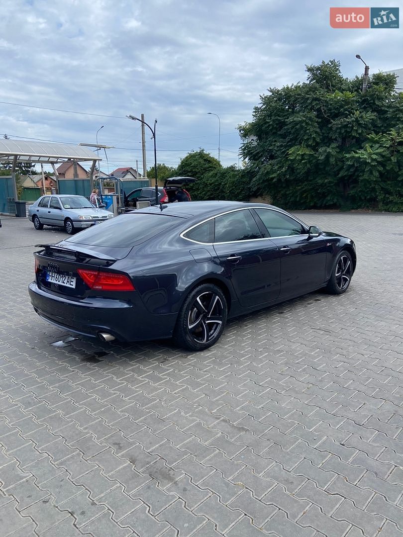 Audi A7 Sportback 2014 VIN WAUWGAFC6FN010960 фото оголошення 5 з 17