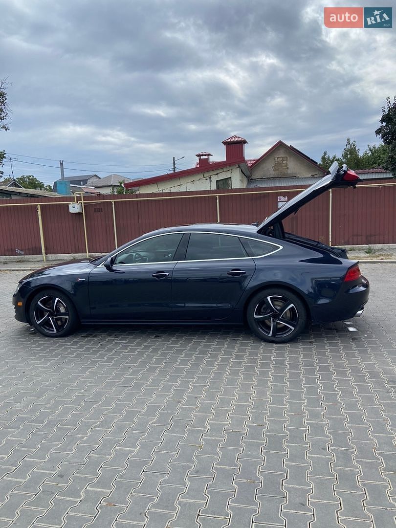 Audi A7 Sportback 2014 VIN WAUWGAFC6FN010960 фото оголошення 12 з 17