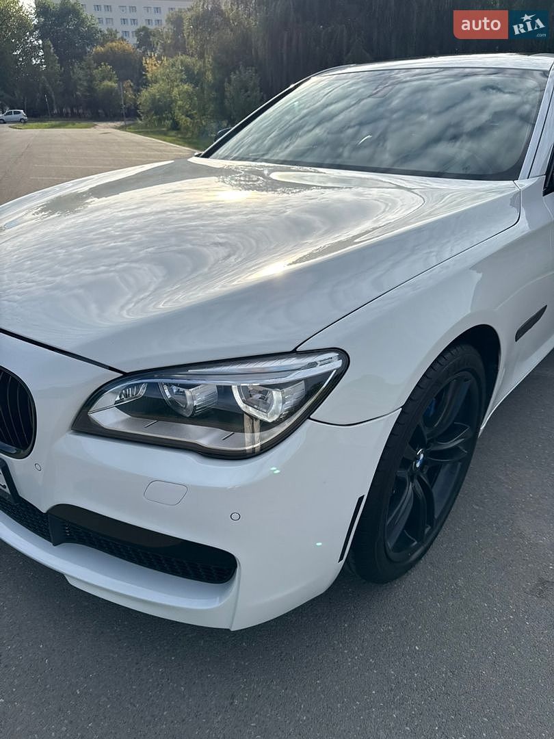 BMW 7 Series 2013 VIN WBAYE4C55DD136915 фото оголошення 2 з 26