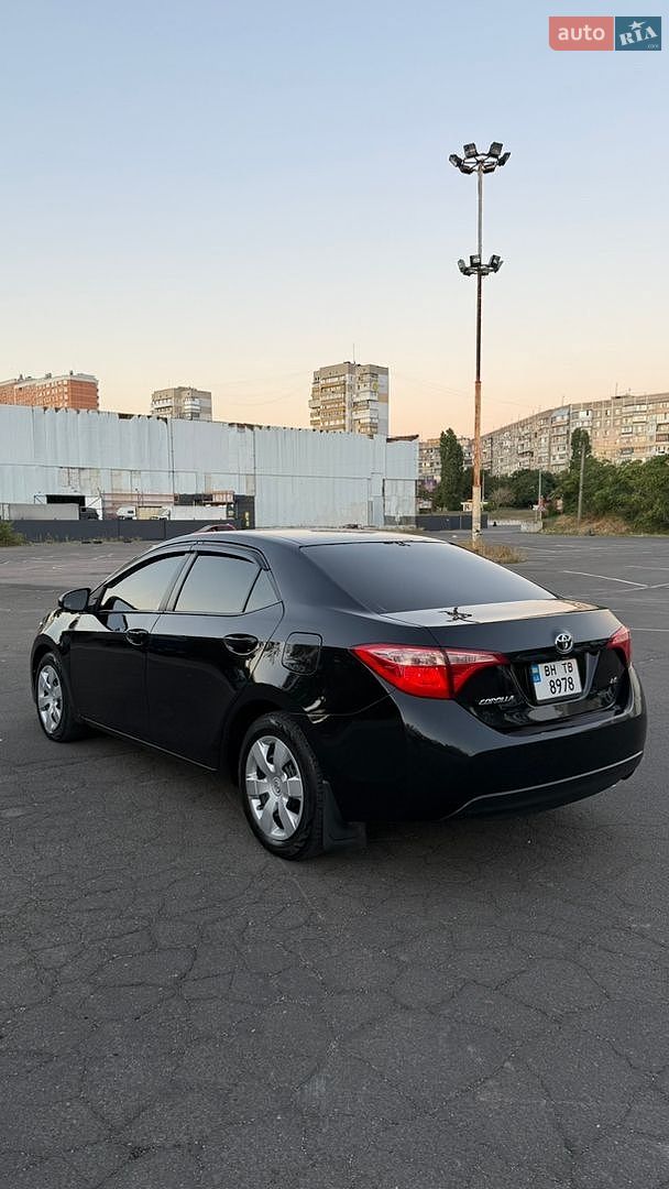 Toyota Corolla 2017 VIN 5YFBURHE7HP638572 фото оголошення 8 з 13