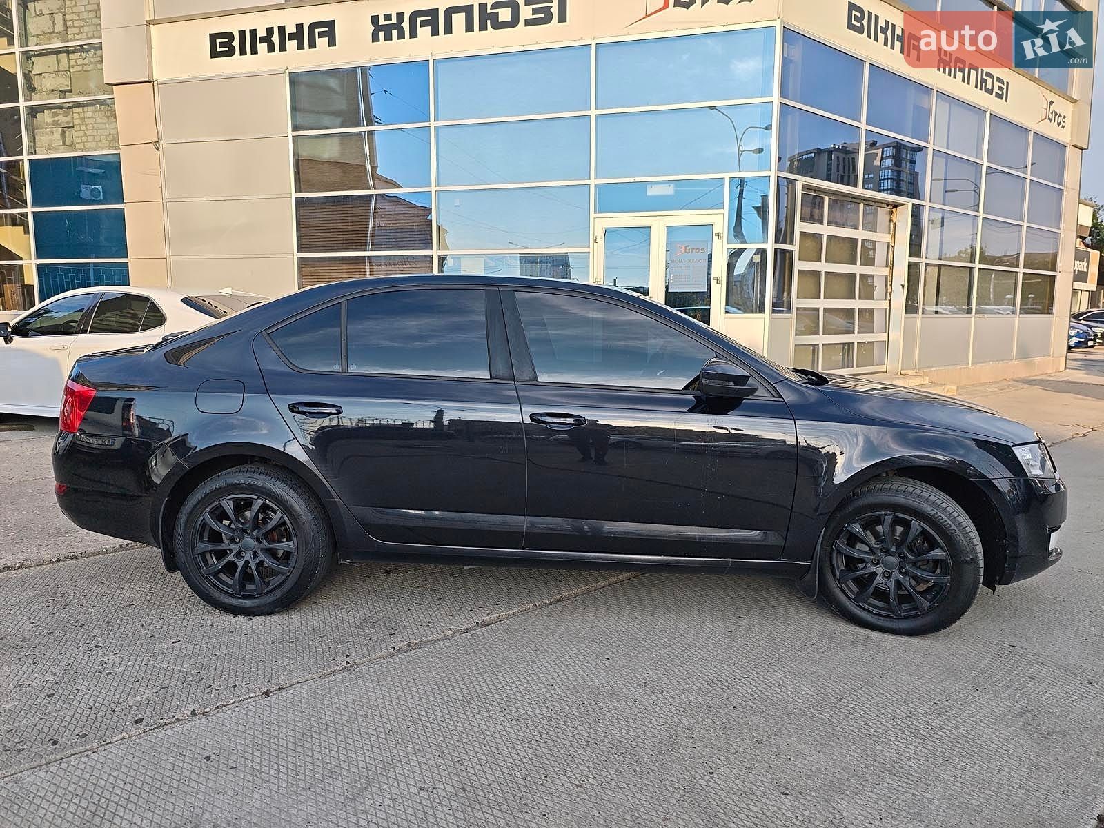 Skoda Octavia 2014 VIN TMBAJ2NE0EB008127 фото оголошення 8 з 11