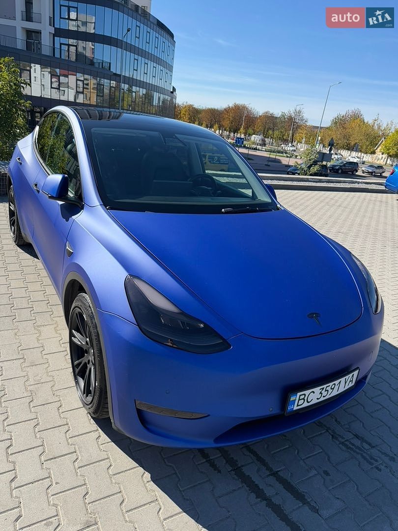 Tesla Model Y 2021 VIN 5YJYGDEE7MF257495 фото оголошення 4 з 22