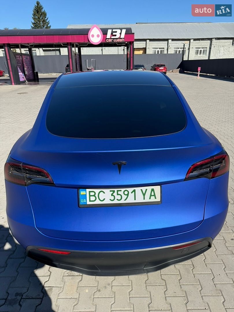 Tesla Model Y 2021 VIN 5YJYGDEE7MF257495 фото оголошення 9 з 22