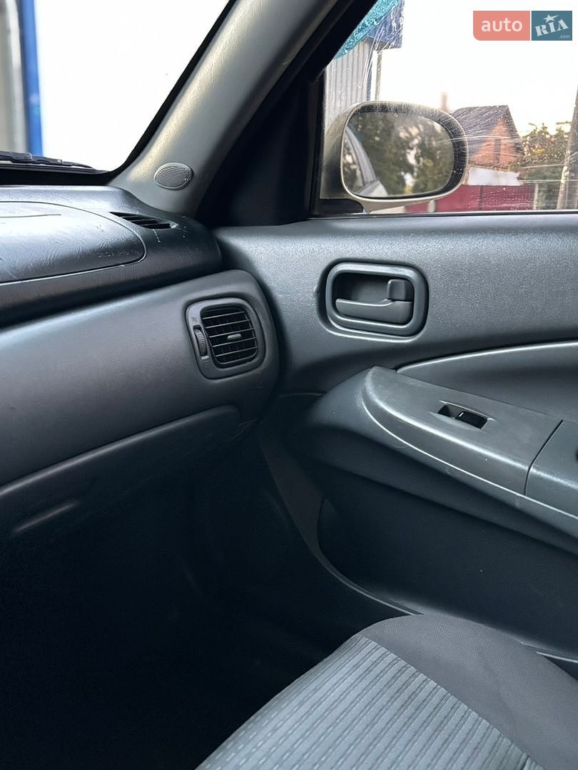 Nissan Almera 2007 VIN KNMCSHLMS7P679681 фото оголошення 20 з 23