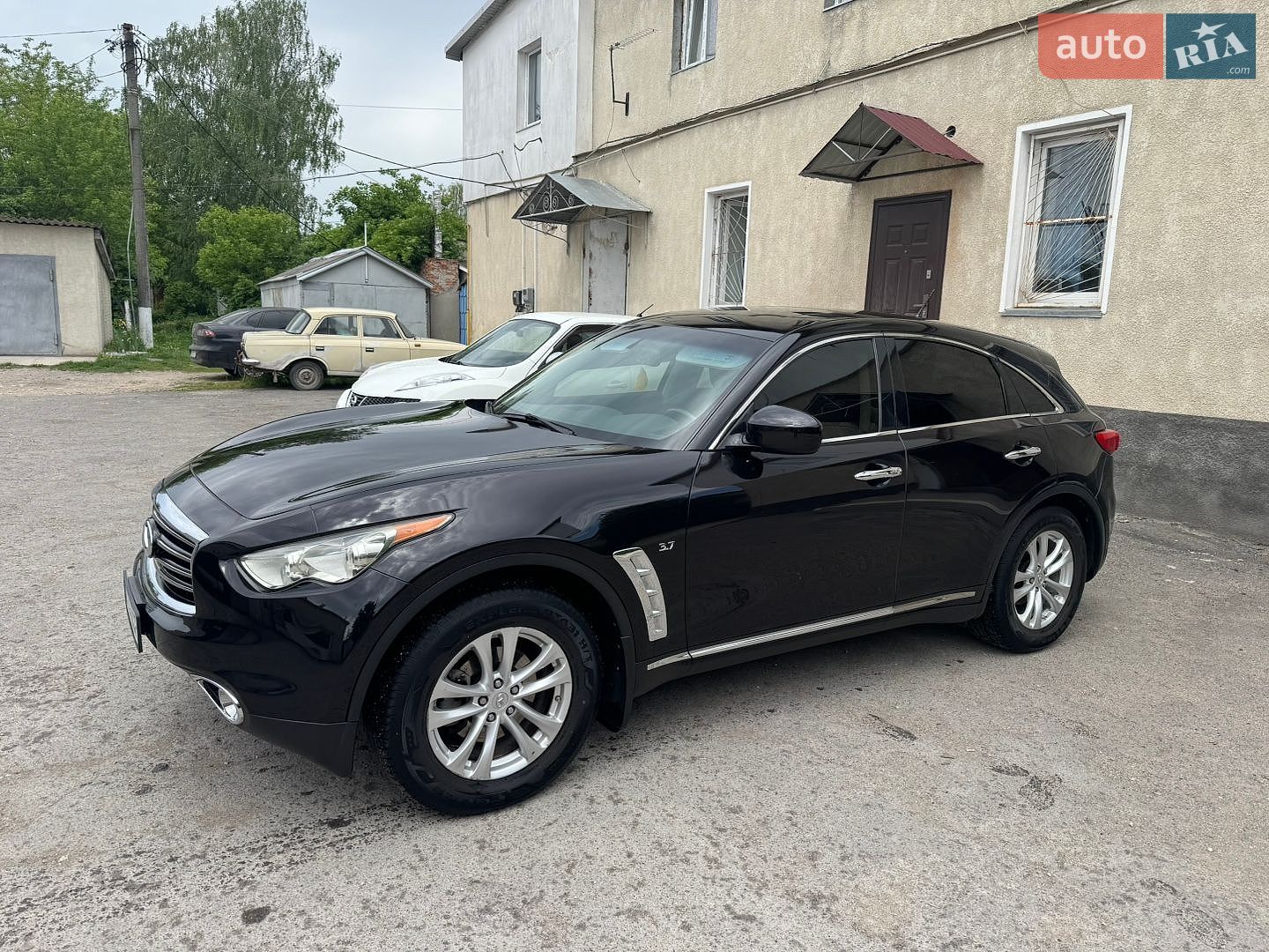Infiniti QX70 2013 VIN JN8CS1MW8EM411873 фото оголошення 2 з 27
