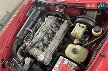 Кабриолет Alfa Romeo Spider 1987 в 