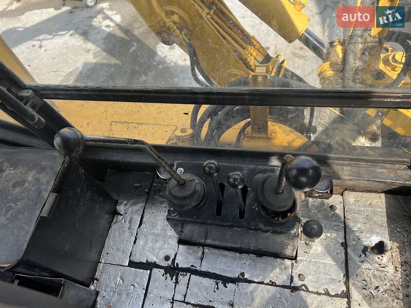 Экскаватор погрузчик АТЕК 999 1997 в Богуславе