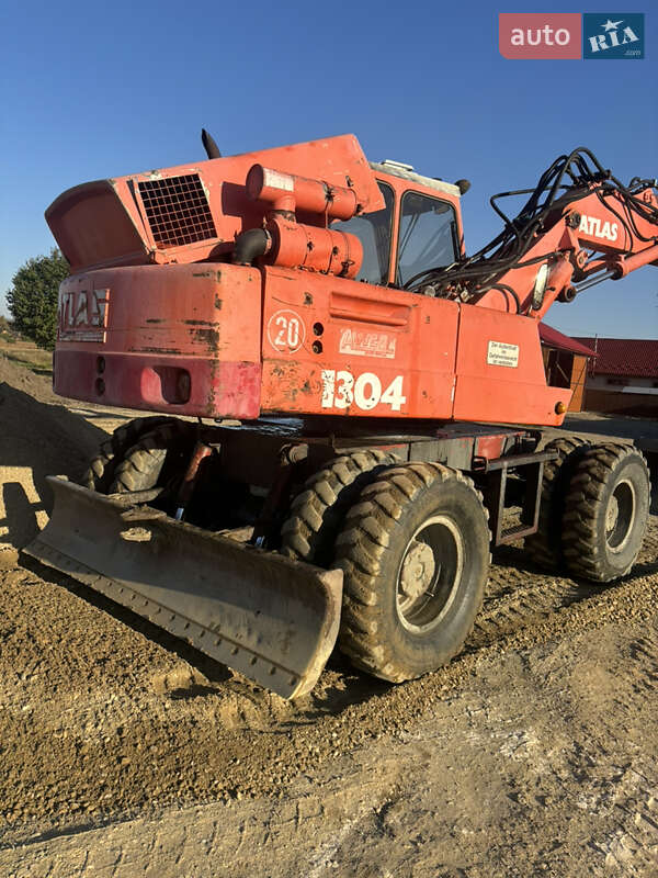 Экскаватор погрузчик Atlas 1304 1992 в Черновцах