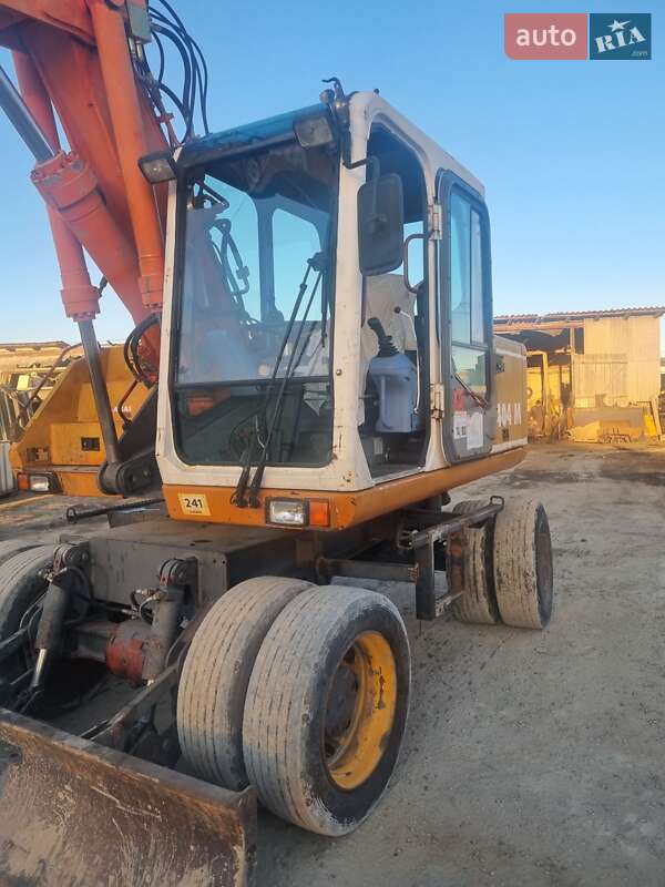 Экскаватор погрузчик Atlas 1404 2002 в Черновцах