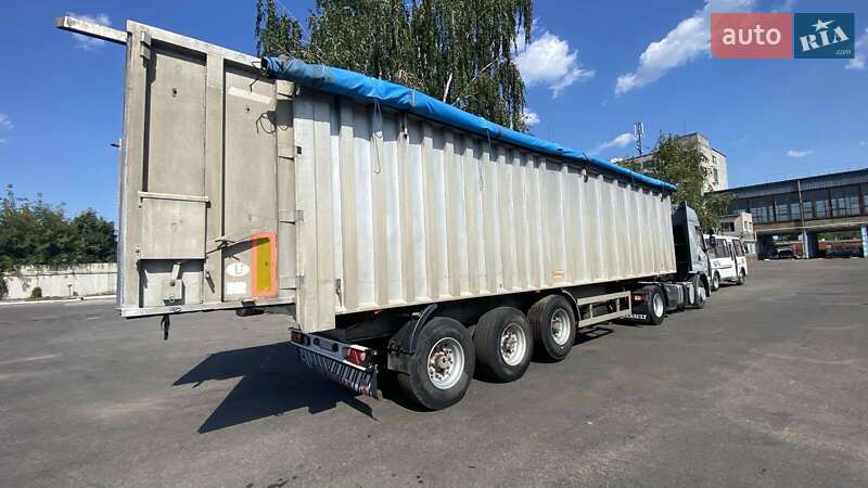 Самосвал полуприцеп Benalu TX 2001 в Шполе