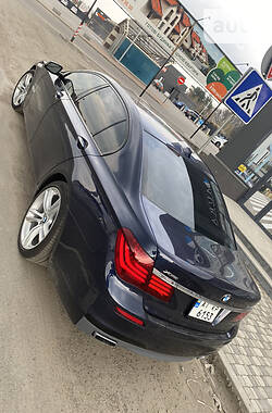 Седан BMW 7 Series 2013 в Вишневом