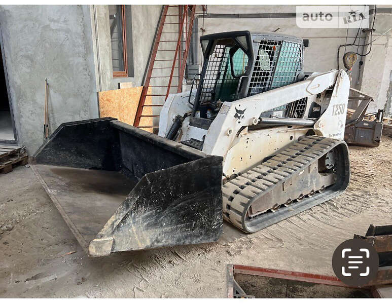 Екскаватор навантажувач Bobcat T250 2006 в 