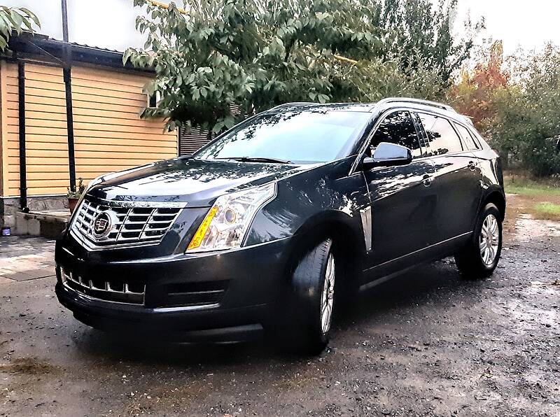 Внедорожник / Кроссовер Cadillac SRX 2015 в 