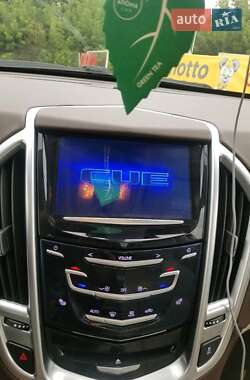 Внедорожник / Кроссовер Cadillac SRX 2014 в 