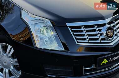 Внедорожник / Кроссовер Cadillac SRX 2014 в 