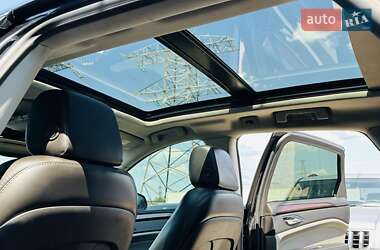 Позашляховик / Кросовер Cadillac SRX 2011 в 