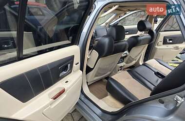 Позашляховик / Кросовер Cadillac SRX 2004 в 