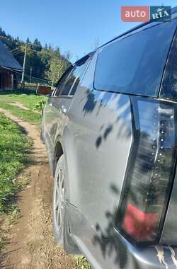 Позашляховик / Кросовер Cadillac SRX 2004 в 