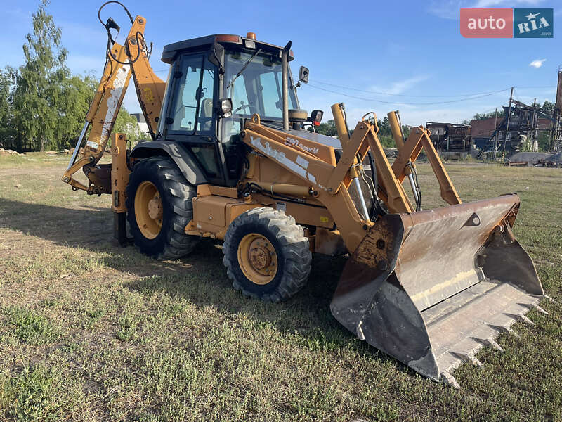 Экскаватор погрузчик Case Construction 590 SL 2003 в Калуше
