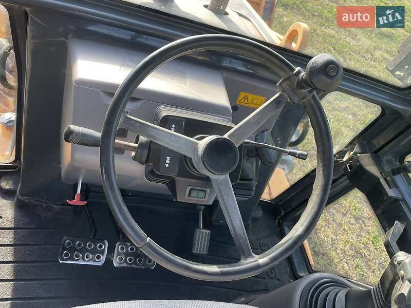 Экскаватор погрузчик Case Construction 590 SL 2003 в Калуше