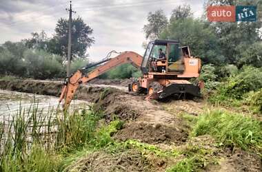 Экскаватор погрузчик Case Construction 695 ST 1994 в 