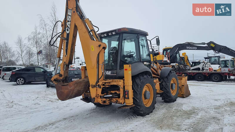 Экскаватор погрузчик Case Construction 695 ST 2009 в Одессе