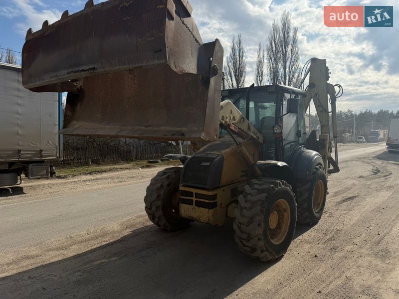 Экскаватор погрузчик Case Construction 695 ST 2002 в Радомышле