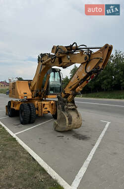 Колесный экскаватор Case Construction WX 165 2005 в 